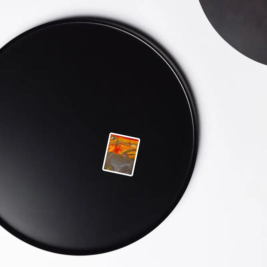Black circular plate featuring a small sticker for Above the Shadows Surrealist art magnet