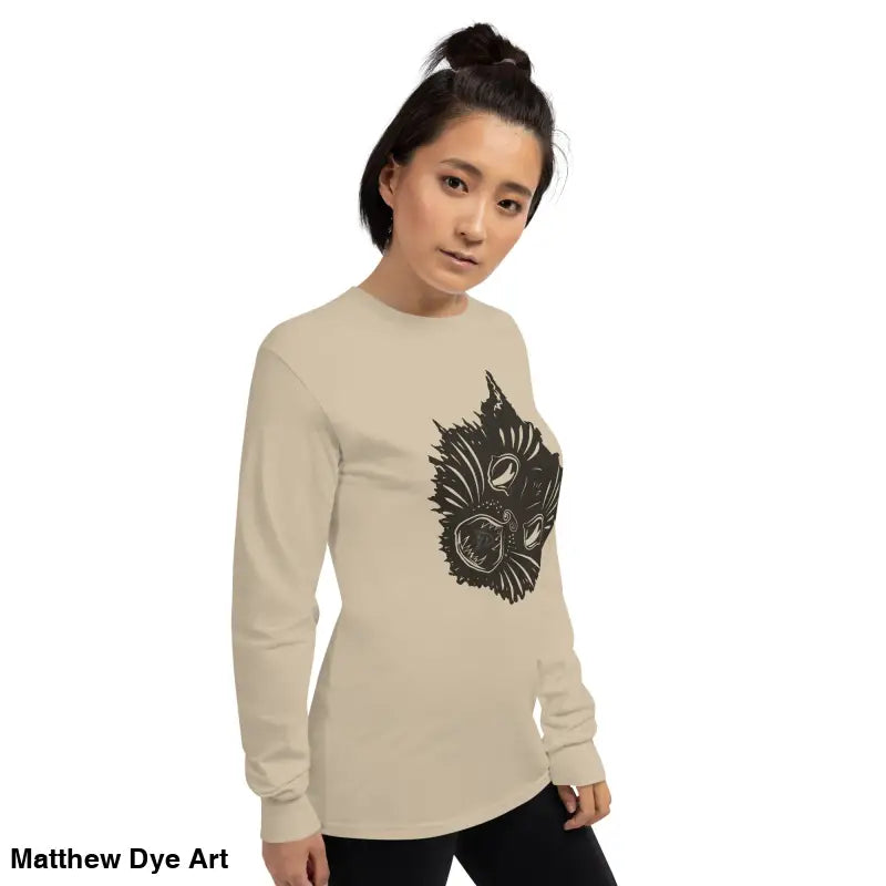 Beige long sleeve shirt featuring a spooky cat graphic for Halloween