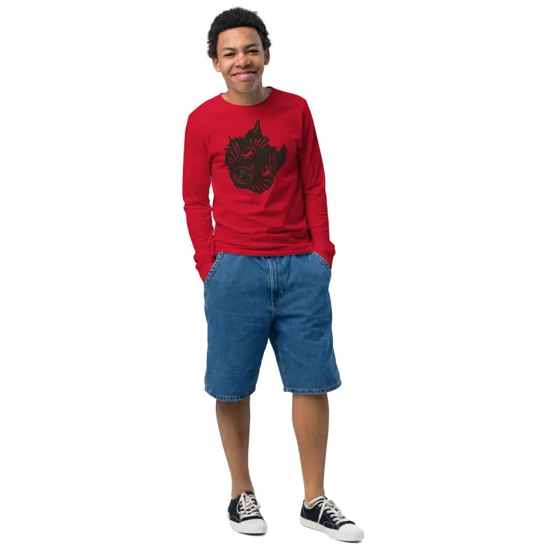 Boy in red long-sleeved Ah Kitty Halloween sweater for kids and denim shorts