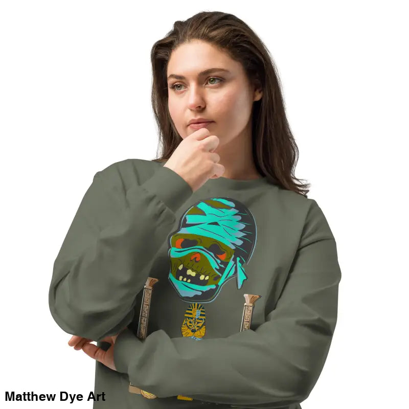 Olive green premium long sleeve sweatshirt featuring mummy mystique design