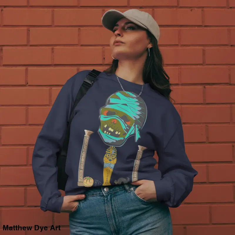 Woman in a premium long sleeve sweatshirt showcasing mummy mystique design