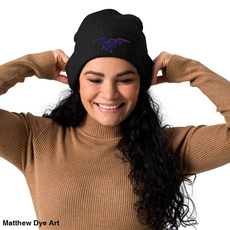Black knit beanie featuring a bat design, perfect for Bat Baby lovers this autumn