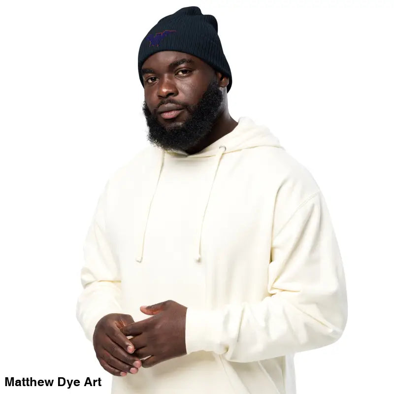 Man in a cozy Bat Baby Beanie, an organic ribbed beanie for autumn and Halloween