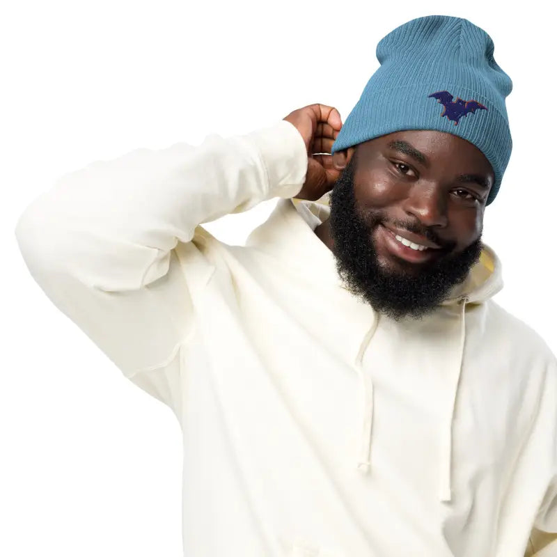 Blue knit beanie with bat emblem for a comfortable and warm Bat Baby accessory