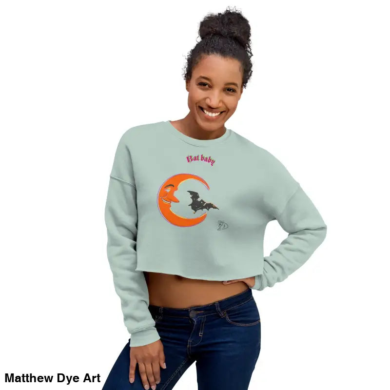 Cropped sweatshirt featuring a moon and bat design, perfect for fall fashion