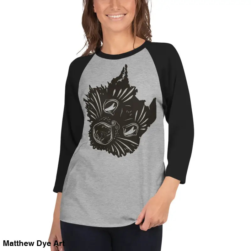 Gray and black raglan shirt featuring a cat graphic for fierce feline fantasy lovers
