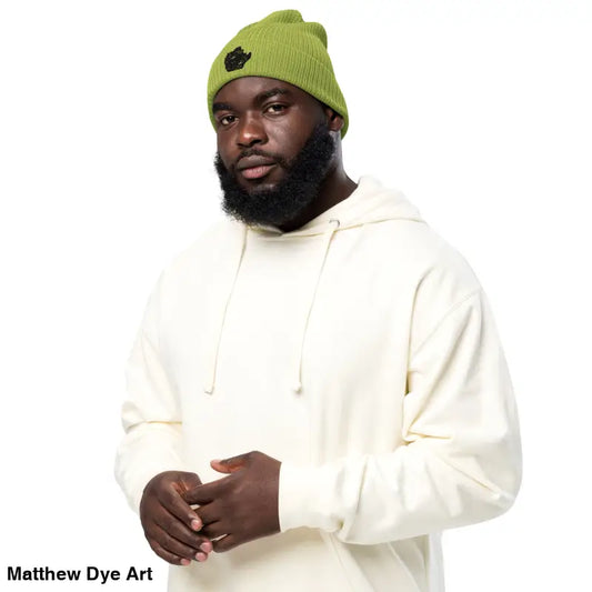 Man in green beanie and cream hoodie showcasing the Kitty Head organic ribbed beanie