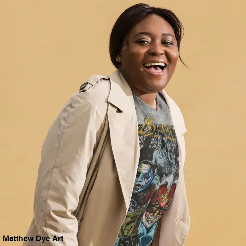 Smiling woman in trench coat and graphic tee showcasing unique Romero cotton sweatshirt