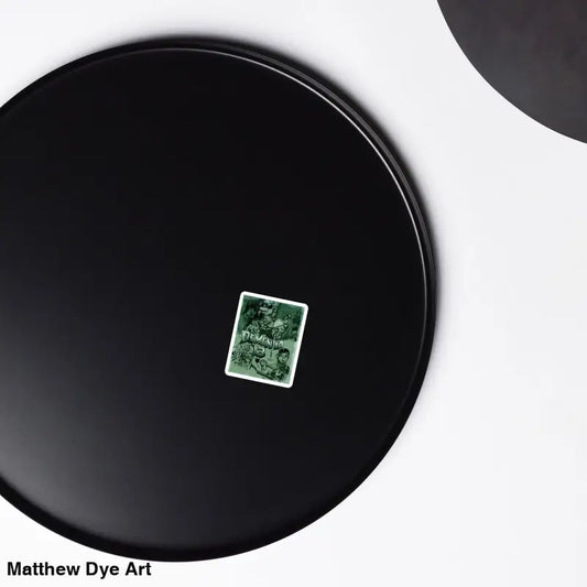 Black plate with green sticker featuring Dementia 13 Retro Horror Magnets design