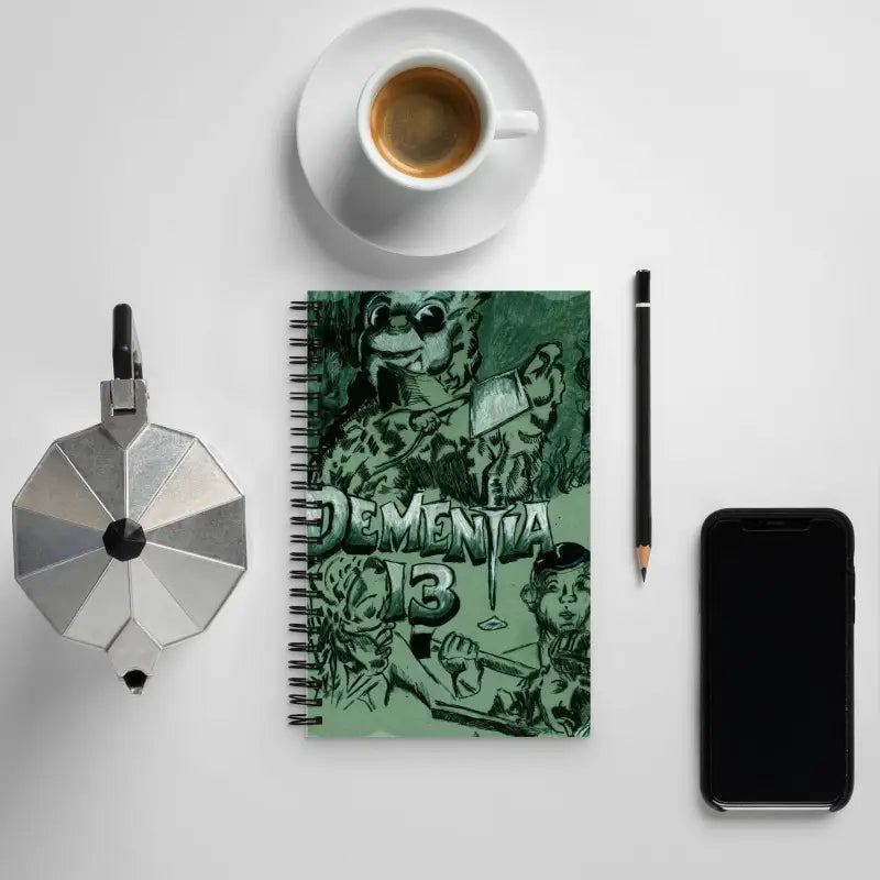 Captivating spiral notebook featuring visionary Matthew Dye’s iconic Eye logo on the cover