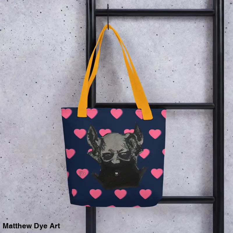Navy tote bag featuring pink hearts and a dramatic demonic figure design for Demonic Whimsy
