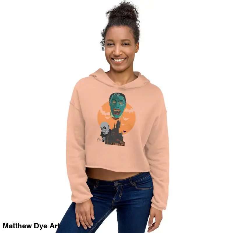 Woman in a meticulously crafted Fangs & Fashion Vampires Crop Hoodie featuring Matthew Dye art