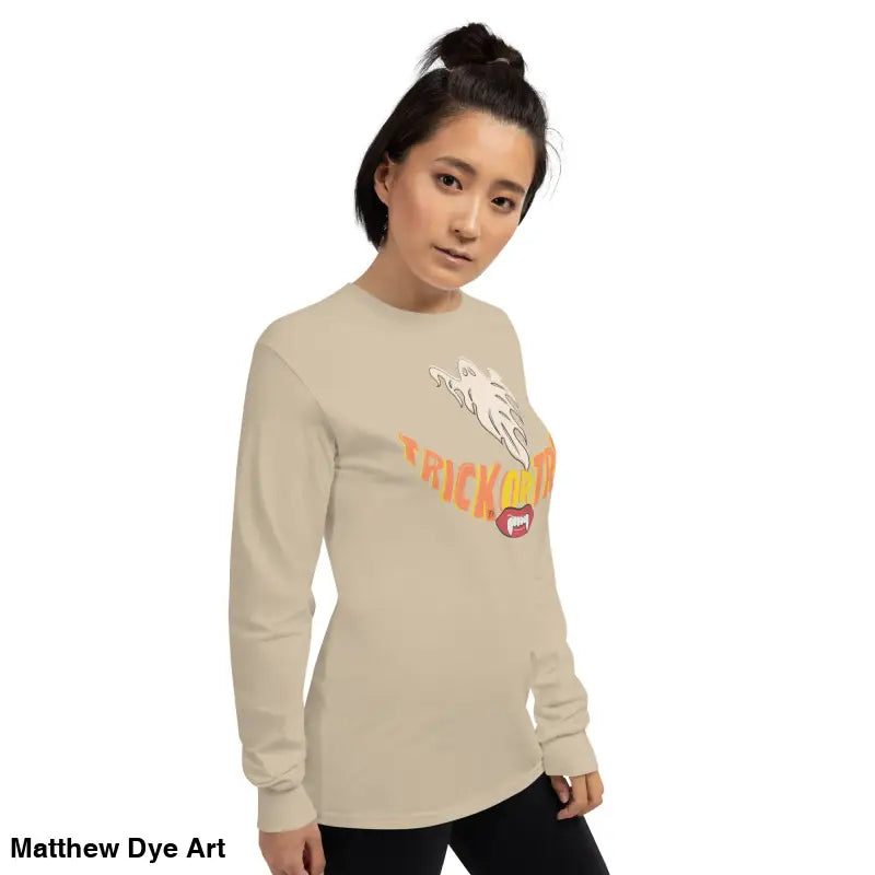 Beige long-sleeved shirt from Ghostly Grin offers spooktacular comfort for trick-or-treating