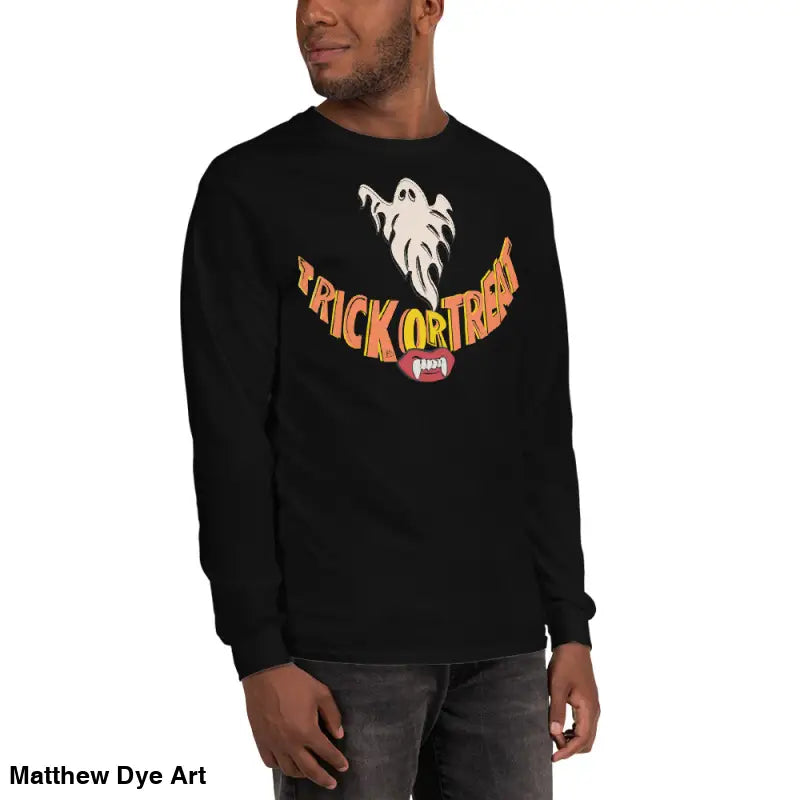 Black long-sleeved Ghostly Grin Tee featuring vampire fangs for spooktacular comfort unisex