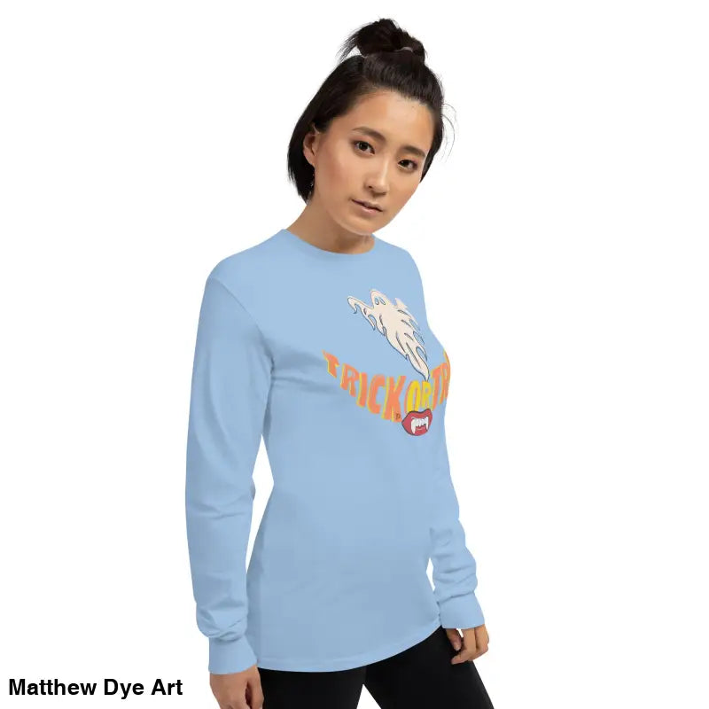 Light blue long-sleeved shirt featuring vampire fangs for spooktacular comfort unisex