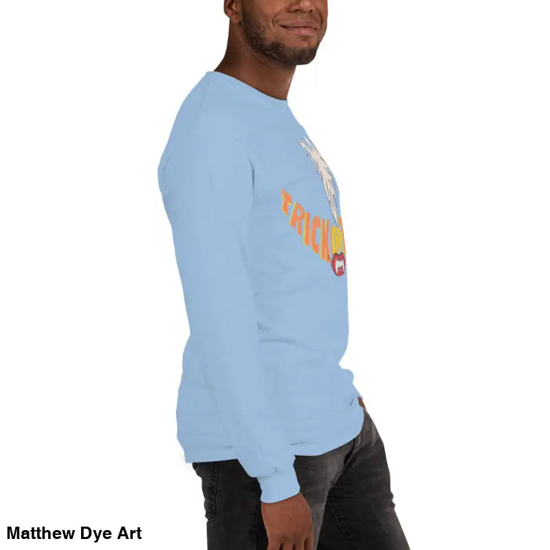 Light blue long-sleeved shirt featuring vampire fangs for spooktacular comfort unisex