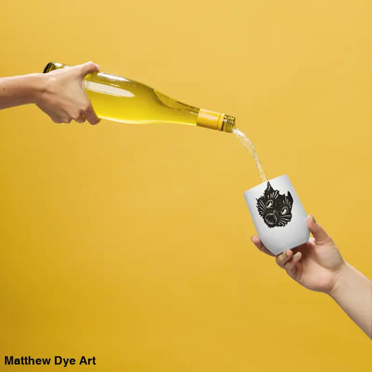 Wine being poured into the enchanting Ah Kitty head wine tumbler for fall festivities