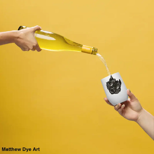 Wine being poured into the enchanting Ah Kitty head wine tumbler for fall festivities