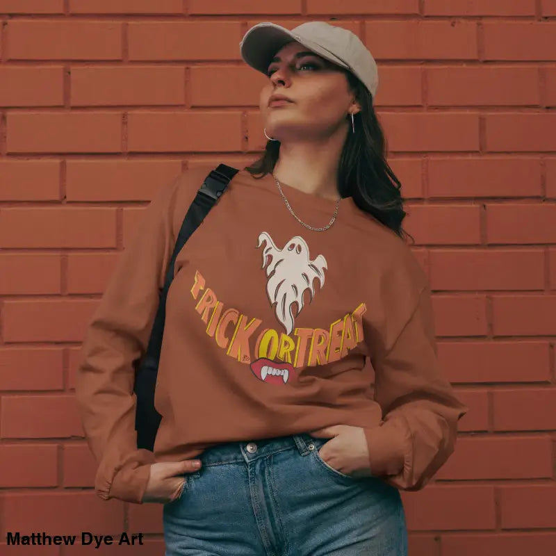 Brown Halloween-themed premium long sleeve shirt featuring Jack-o’-Lantern Glow design