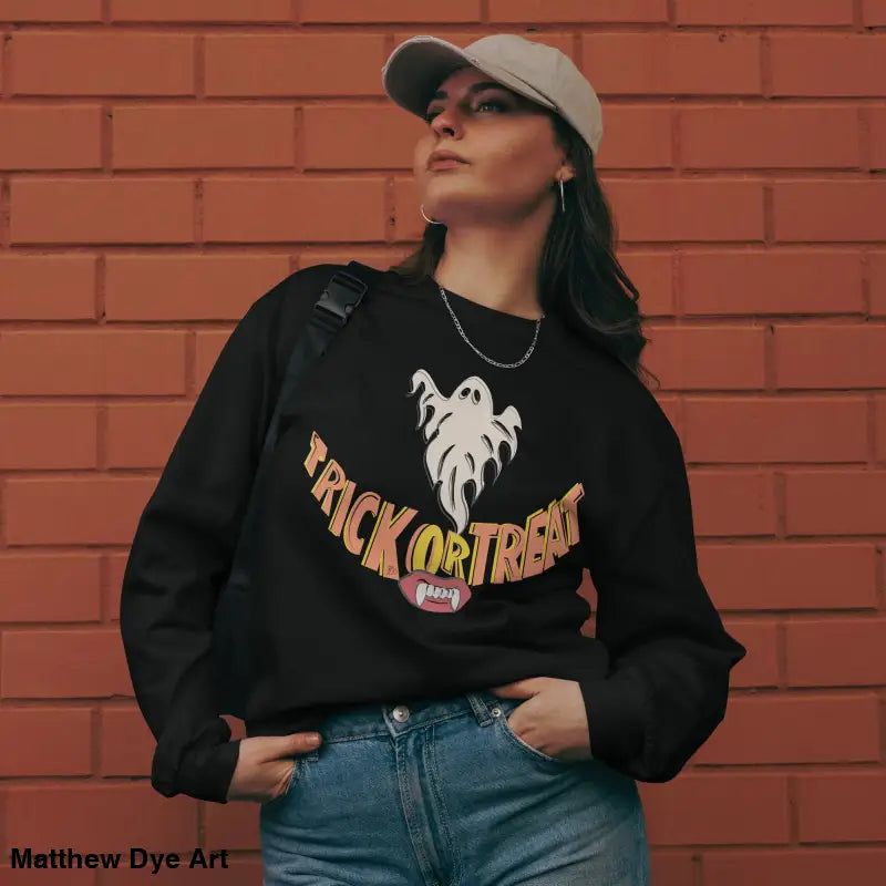 Black Halloween sweatshirt featuring Jack-o’-Lantern Glow vintage art, a premium long sleeve