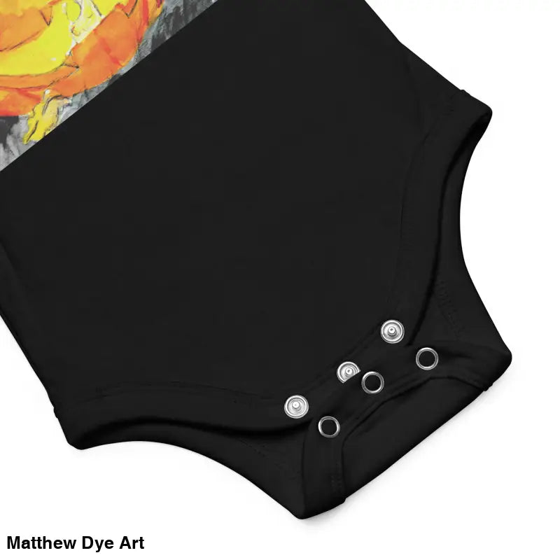 Black baby onesie with snap closures in combed ring-spun cotton featuring adorable jack-o’-lantern