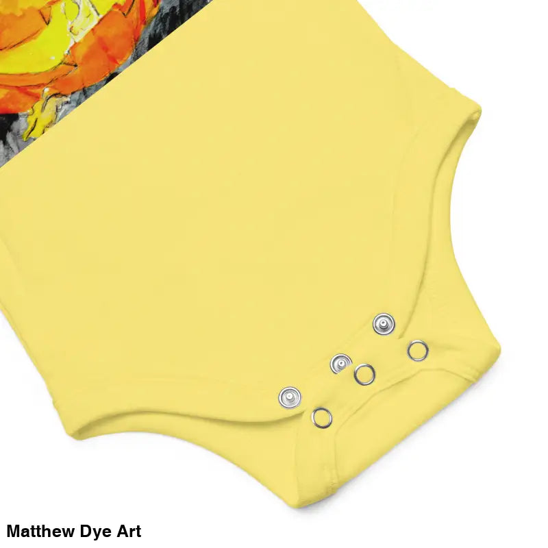 Yellow baby bodysuit with snap closures, featuring an adorable jack-o’-lantern design