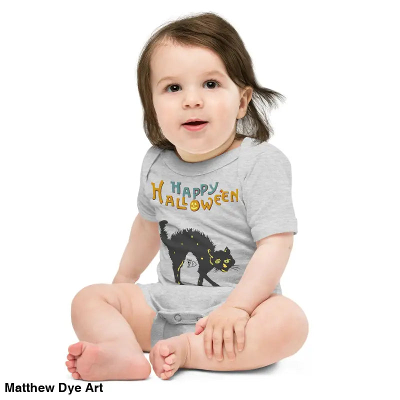 Baby in a Halloween-themed onesie featuring a scary cat Halloween design