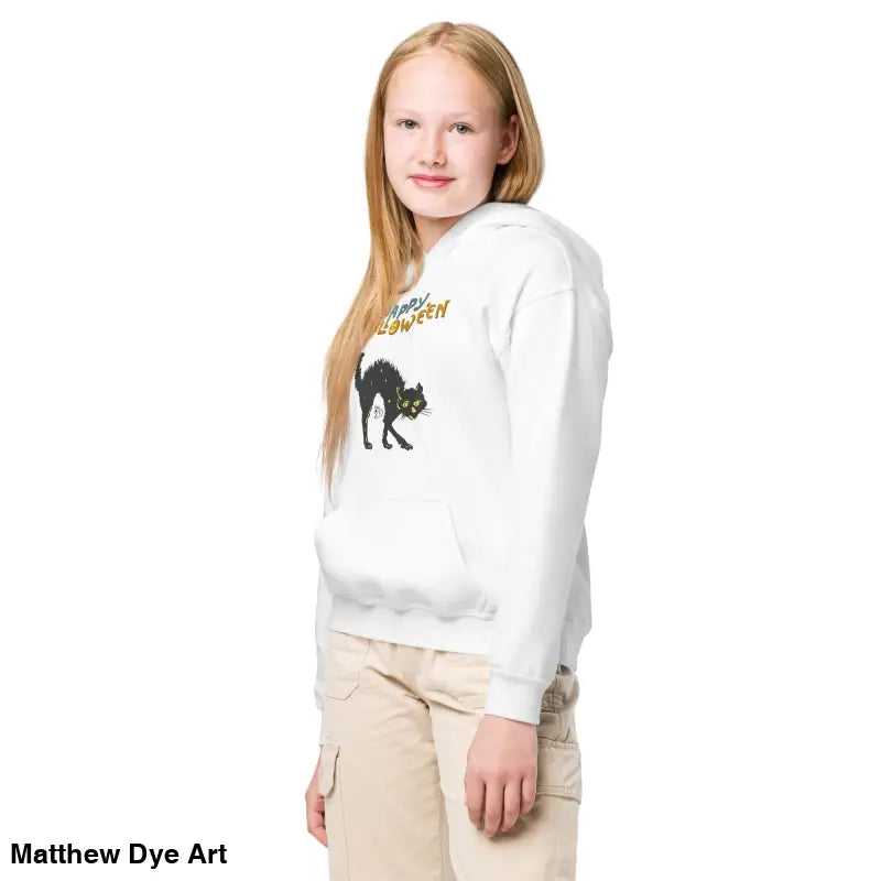 Girl wearing a heavy blend hoodie with Halloween charm from Little Monsters Approved