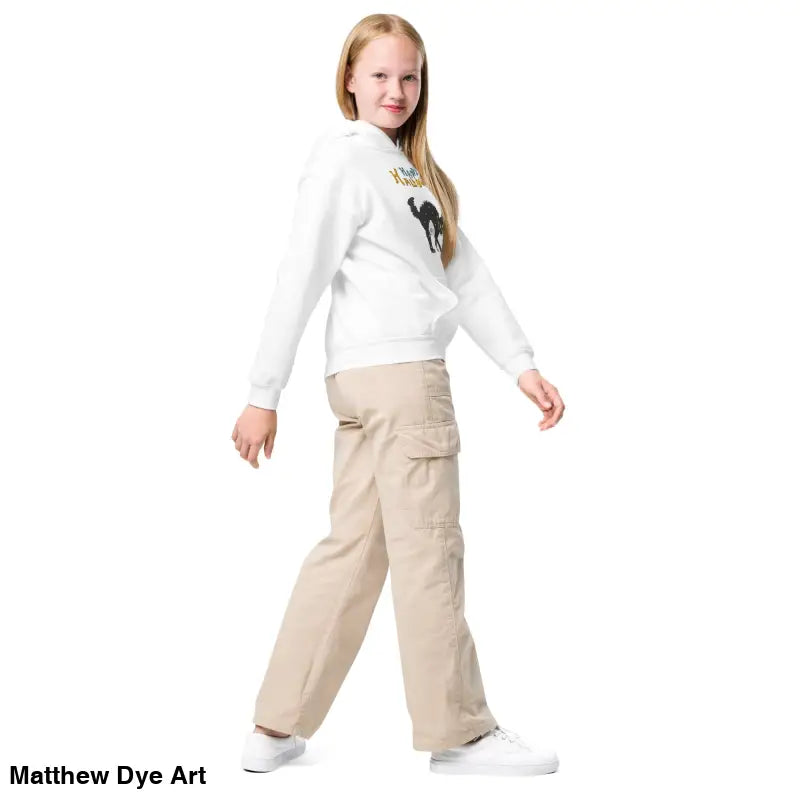 Girl in white hoodie and khaki cargo pants showcasing Halloween charm in stylish hoodie