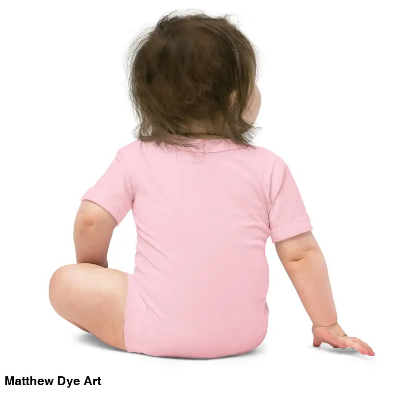 Baby wearing a pink onesie featuring a vintage black cat design in a cat baby one-piece