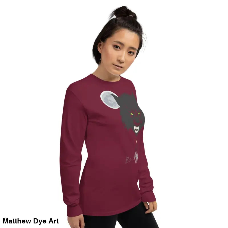 Maroon long-sleeved shirt featuring werewolf graphic with neon-green eyes, Lunar Menace Long-Sleeve