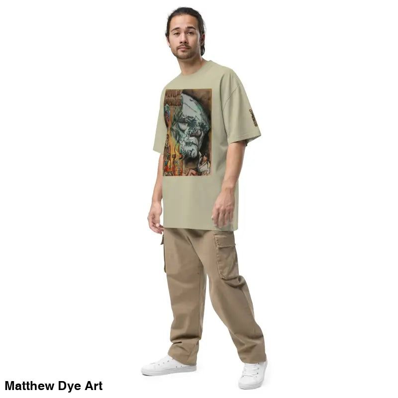 Man in oversized faded t-shirt and cargo pants featuring Evil of Frankenstein design