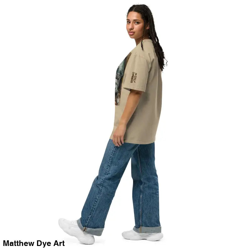 Woman in oversized faded t-shirt and blue jeans featuring Evil of Frankenstein design