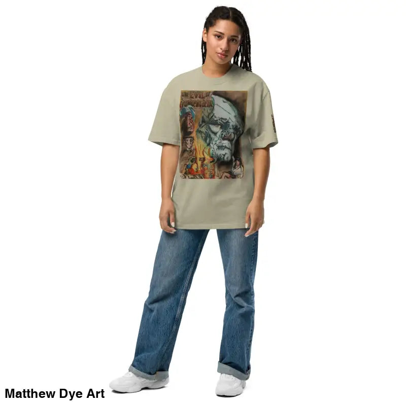 Woman in oversized faded t-shirt featuring Evil of Frankenstein from classic horror film