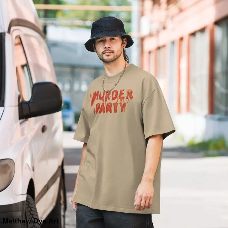 Man in Murder Party Mayhem Oversized T-Shirt showcasing vintage slasher style and wide neck ribbing