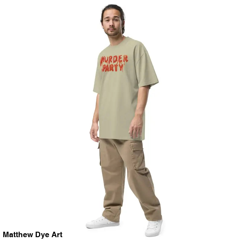 Man wearing Murder Party Mayhem oversized t-shirt with wide neck ribbing and cargo pants