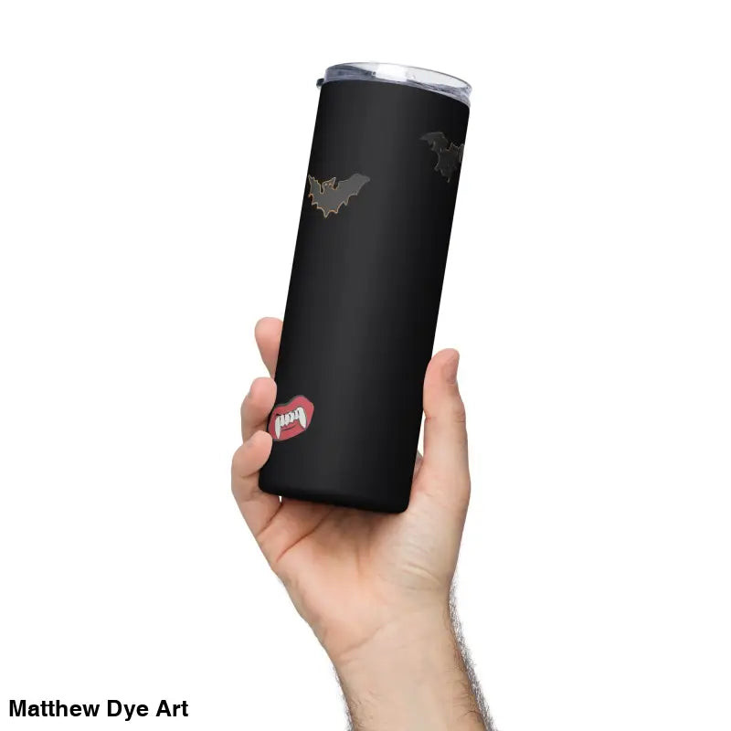 Black stainless steel tumbler featuring Matthew Dye art with bat and fang designs