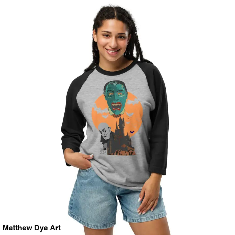 Gray and black baseball raglan featuring a monster graphic for vintage horror fans