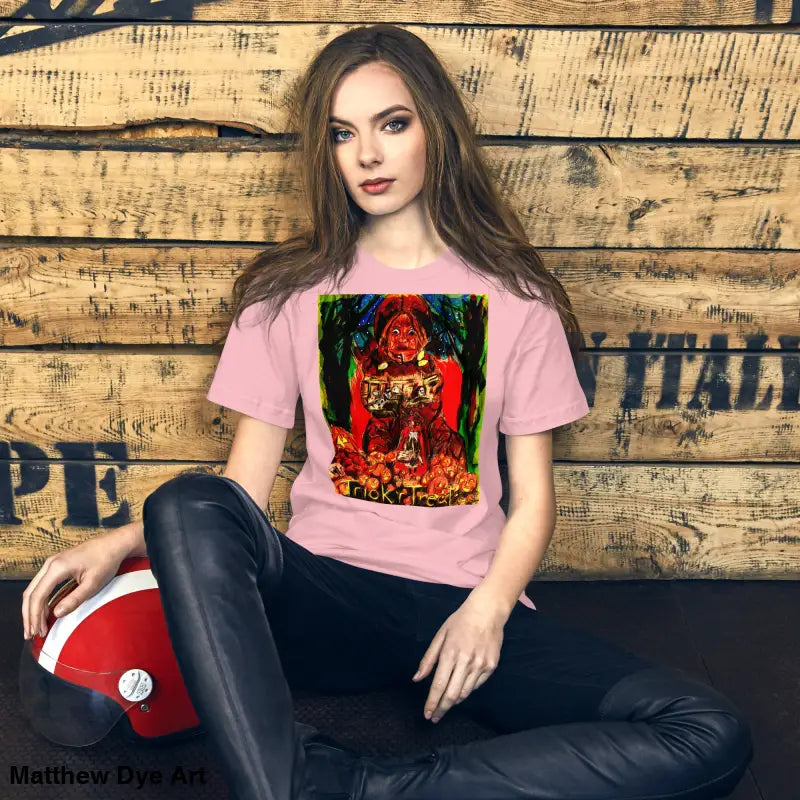 Pink unisex t-shirt featuring colorful graphic for Halloween trick r treat celebrations