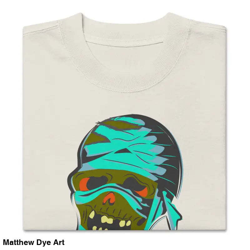 Folded mummy unisex oversized faded t-shirt featuring nostalgic Halloween design art