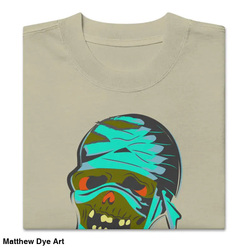 Folded Pharaoh’s Curse Oversized Tee featuring a mummy graphic in nostalgic Halloween design