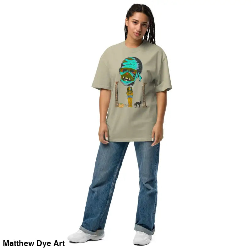 Woman in Pharaoh’s Curse Oversized Tee, a nostalgic Halloween design with a surreal touch