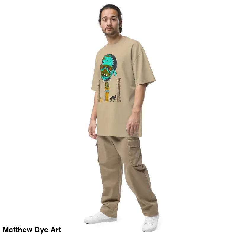 Man in tan t-shirt and cargo pants showcasing the mummy unisex oversized faded t-shirt