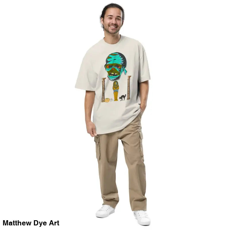 Man wearing Pharaoh’s Curse oversized tee and cargo pants with nostalgic Halloween design