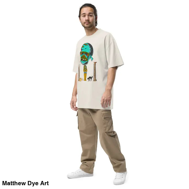 Man in a Pharaoh’s Curse oversized tee and cargo pants with a nostalgic Halloween design