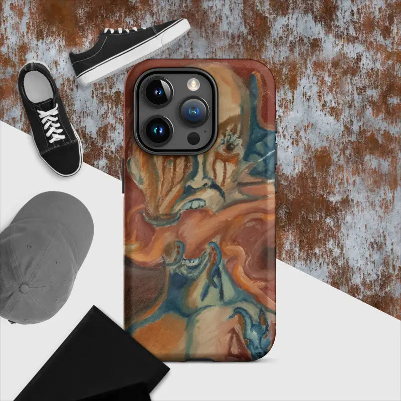 Haunted Tough Case showcasing an artistic orange and blue marble pattern for iPhone protection