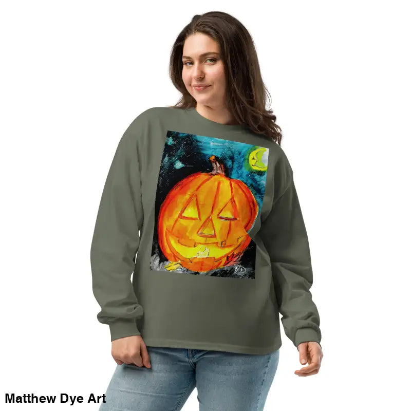 Olive green sweatshirt featuring Matthew Dye Art’s whimsical jack-o’-lantern design