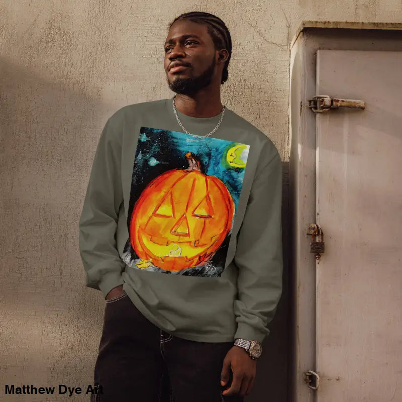 Long-sleeved shirt featuring Matthew Dye Art’s whimsical jack-o’-lantern design