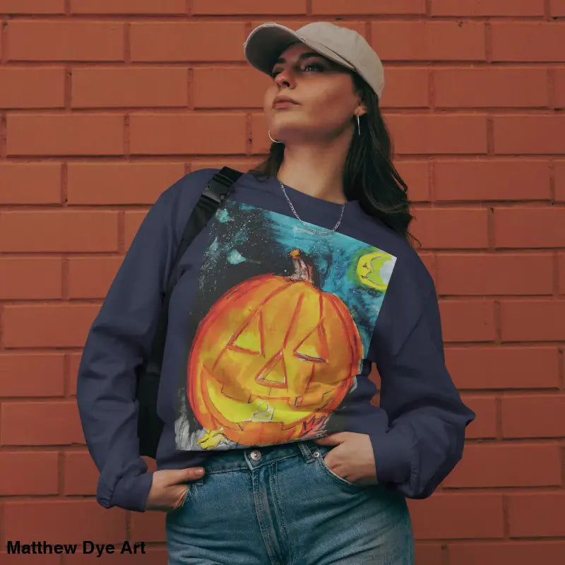 Halloween-themed sweatshirt featuring Matthew Dye Art’s whimsical Jack-o’-Lantern design