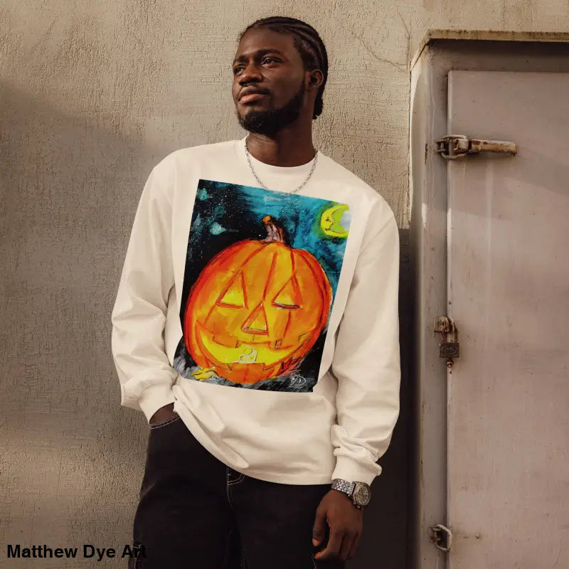 Long-sleeved Halloween pumpkin shirt featuring Matthew Dye Art’s whimsical jack-o’-lantern design